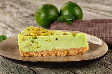Green pistachio cheesecake served mint