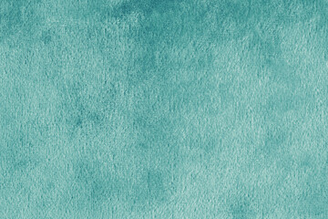 Obraz premium Faux fur, shiny silk velvet turquoise fabric or cloth macro, close up. Fluffy fabric texture of artificial fur textile material. Canvas background. Decorative velours fabric backdrop, wallpaper