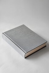 Closed Gray Book on White Background