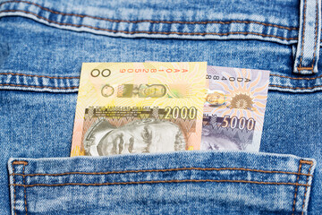 Malawian Kwacha in the pocket of blue jeans