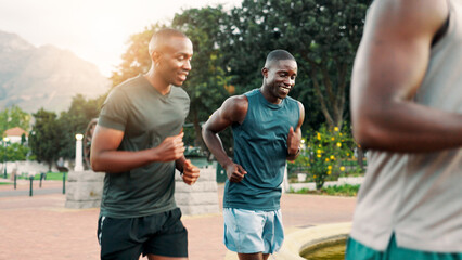 Fototapeta premium Running, friends and men in park for fitness, cardio workout and exercise outdoors. Sports, nature and people for performance, endurance and challenge for health, wellness and marathon training