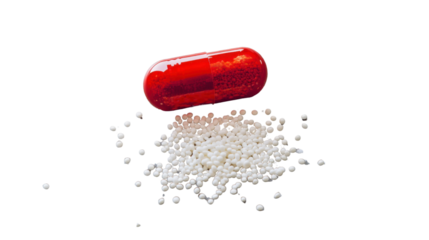 Red pill releasing white granules on transparent background