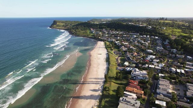 Beachfront Homes With View Of Pat Morton Lookout In Distance. Seven Mile Beach In Lennox Head, NSW, Australia. aerial pullback shot