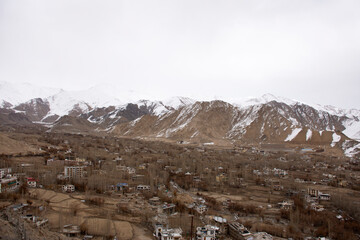 View landscape and cityscape of Leh Ladakh Village with high mountain range from viewpoint Shanti...
