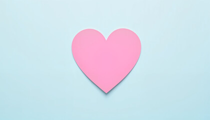 Bright pink heart paper cutout on pastel blue backdrop, love symbolism