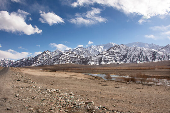 View landscape high range mountain and Sindhu or Indus River on Leh Manali and Srinagar Leh Highway while winter season at Leh Ladakh in Jammu and Kashmir, India