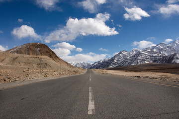 View landscape with Himalayas mountains and between journey Pangong Tso high grassland lake go to Leh Ladakh on Leh Manali and Srinagar Leh Highway while winter season in Jammu and Kashmir, India