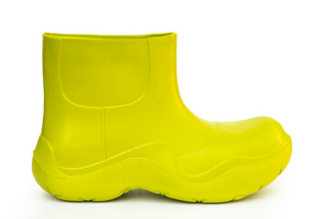 green rubber boots on white isolated background