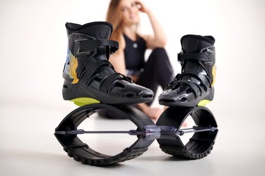 Kangoo Jumps rebound boots for cardio and fitness training, isolated on white background