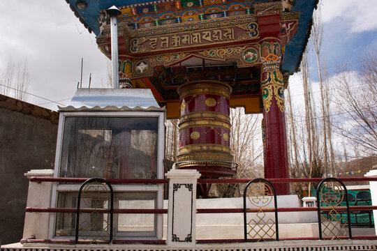 Indian and tibetan people visit and  pray and rite rotate and spin Prayer wheels Leh Ladakh village at Himalayan valley in Jammu and Kashmir, India