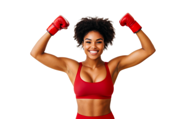 Strong woman celebrating victory with boxing gloves and smile