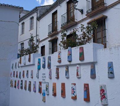 Setenil de las Bodegas, Spain - Mar 15, 2025: Walking in Setenil de las Bodegas. Streets, buildings. Lifestyle in the urban area. Sunny winter day. Selective focus