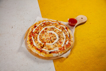 Chicken tikka masala thin crusted pizza baked in wood fired oven
