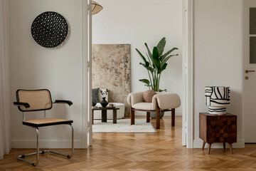 Elegant home interior with a blend of contemporary and natural materials. Warm neutrals, textured...