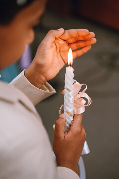 Boy holding a candle