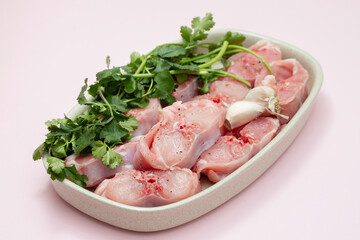 Fresh raw rabbit meat on dish