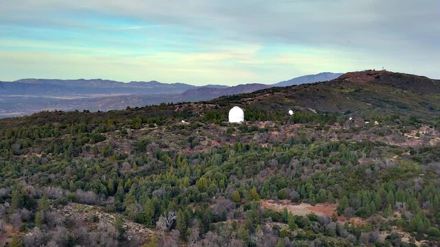 Distant View Of Palomar Observatory On Palomar Mountains In San Diego County, California. wide drone shot
