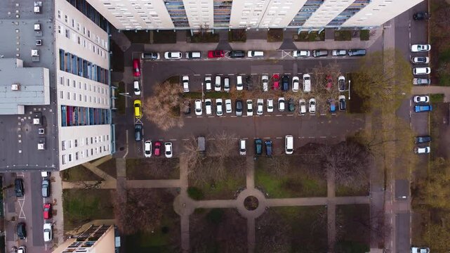 Aerial drone top shot of Budapest rooftops, courtyards, and narrow streets within city