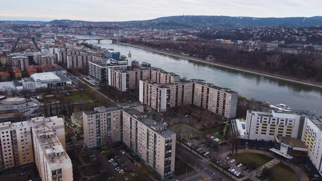 Drone establishing Budapest high rise apartments and commercial buildings in a densely populated district