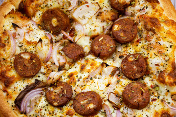 Pizza indian style in restaurant sale and serve for people in New Delhi, India