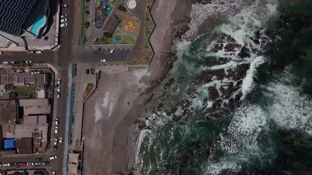 Iquique playa brava chile tarapaca cavancha day beach blue sky city at noon drone