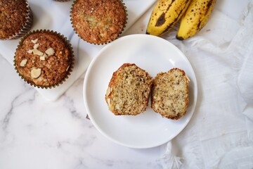 Homemade Banana muffins topped with nuts, selective focus