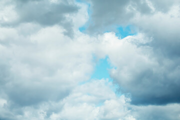 Cumulus clouds in the blue sky on a sunny day.
