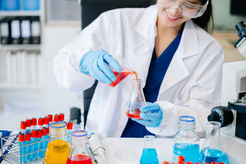 Fototapeta premium Scientists, beakers, and microscopes in cutting-edge research. Perfect for science and technology projects.