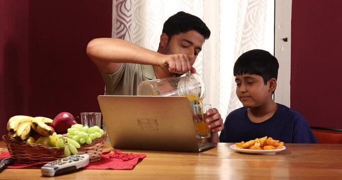 Father and son enjoying their drinks