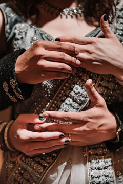 Close-ups details or poses of engaged couple's hands with ring