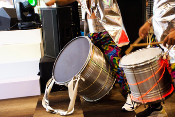 Music band and thai actor or musician play classic instrument drum set and dancing to beat with...