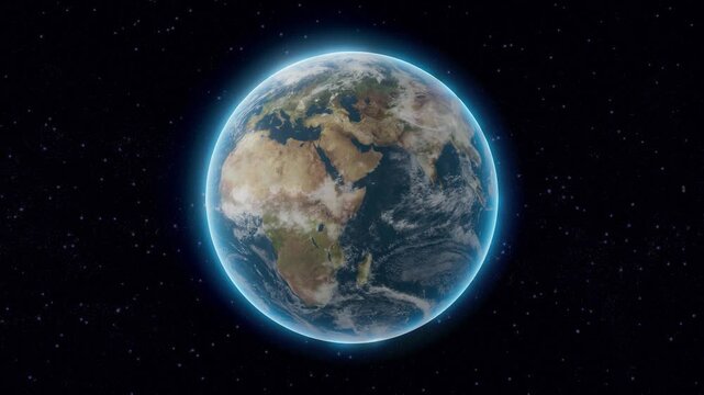 Planet earth revolving slowing in a seamless loop on a dark background