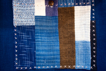 Thai craftsmanship technician or professional artist sewing garment patchwork clothes hand woven...