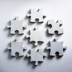 Fototapeta premium Alcuni pezzi di puzzle bianco su sfondo bianco