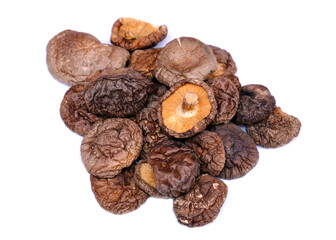 Dried shiitake mushrooms isolated on white background.