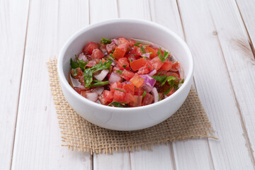 Vinagrete, typical brazilian sauce with tomato, onion, vinegar, olive oil and parsley