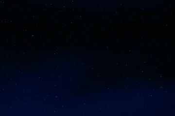 Starry night sky. Galaxy space. Glowing stars in the night. New Year, Christmas and celebration background concept.
