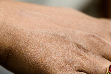 Close-up view of a textured hand at an artisan workshop