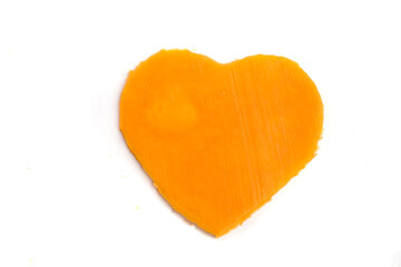 heart shaped piece of cheddar cheese
