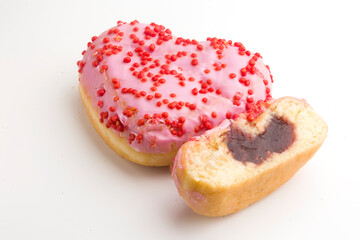 heart shaped donut on white background