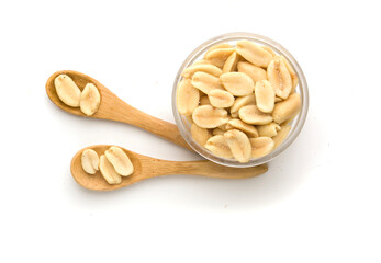 bowl and spoons with roasted peanuts