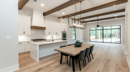 Rustic farmhouse dining setup with reclaimed wood table, warm candlelight, and an open-concept kitchen.