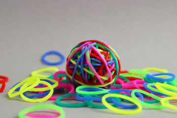 Sphere formed with different colored rubber bands