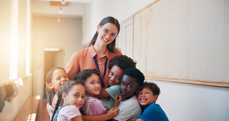 School, portrait and children hugging teacher for bonding, learning and education development. Happy, connection and kids embracing woman educator for greeting or welcome at kindergarten academy.