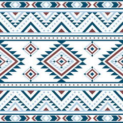 Naklejka premium Aztec Navajo tribal Native American geometric seamless pattern. Colorful ethnic design for fabric, textile, blanket, rug, carpet, and fashion.