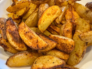 Home Cut Baked French Fries In A White Bowl