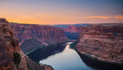 canyon view at sunset with vibrant colors reflecting on water