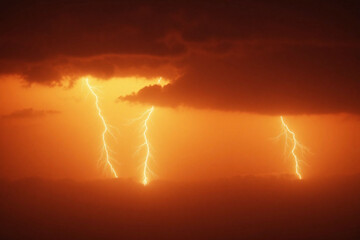 cross in the sky with lightning coming out of it