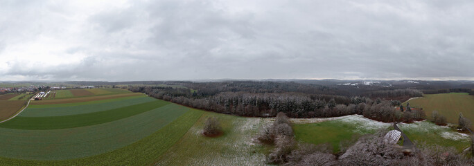 Winter landscape in Germany with frozen frost on trees and fields, drone shot © A.Freund