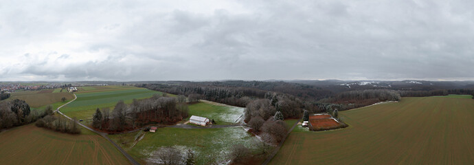 Winter landscape in Germany with frozen frost on trees and fields, drone shot © A.Freund